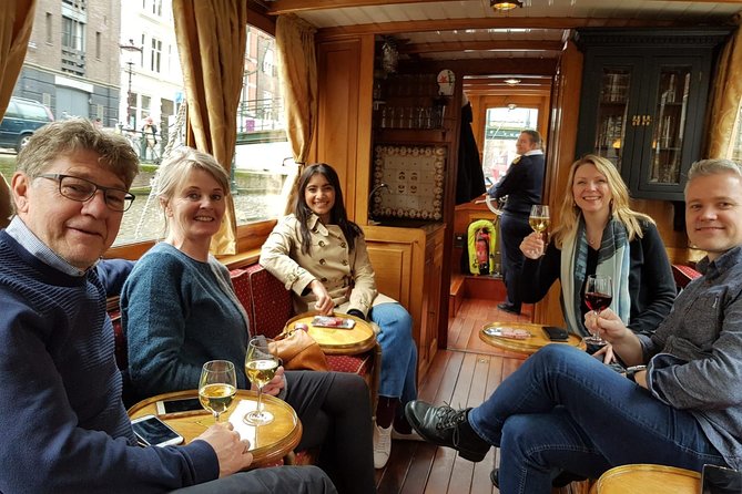 Eating Amsterdam: Food Tour & Canals Cruise - Canals, old houses, and the De Gangen alleys