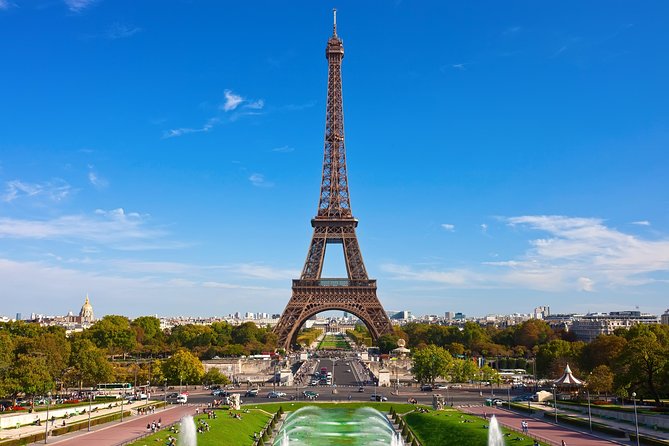 Eiffel Tower Summit Option with Seine River Cruise and City Tour - Reaching the Eiffel Tower and its second floor