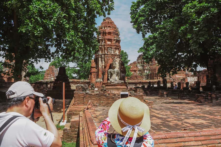 From Bangkok: Ayutthaya Day Tour by Bus with River Cruise - Wat Maha That and the Buddha head in the tree