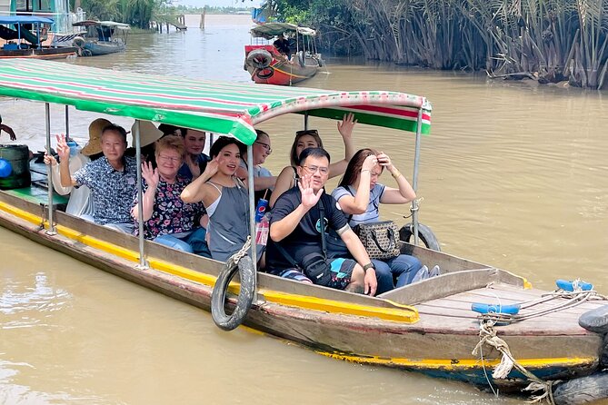 From Ho Chi Minh City: Discover Mekong Delta & Coconut Village - Entering the smaller canal near Ben Tre