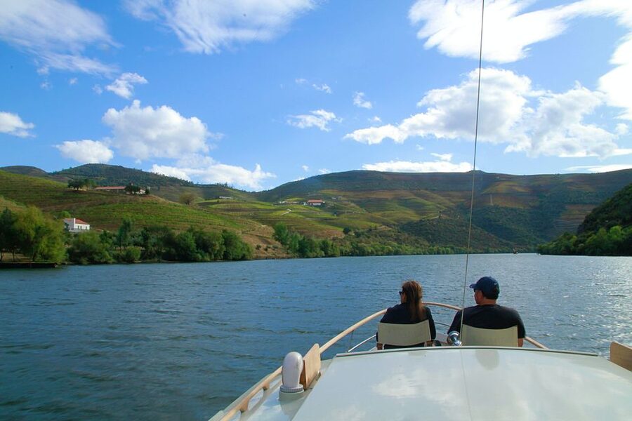 From Pinhão: Private Yacht Cruise along the Douro River - A glass of Port wine with the scenery