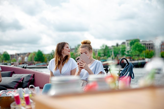 Guided Amsterdam Canal Cruise – Snacks & Drinks on board(1 Hour) - Maritime power beside the replica VOC ship