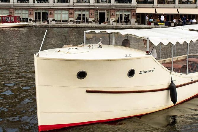 Guided Amsterdam Canal Cruise – Snacks & Drinks on board(1 Hour) - NEMO and the city’s modern side