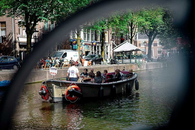 Guided Amsterdam Canal Cruise – Snacks & Drinks on board(1 Hour) - Jewish Amsterdam and the weight of memory