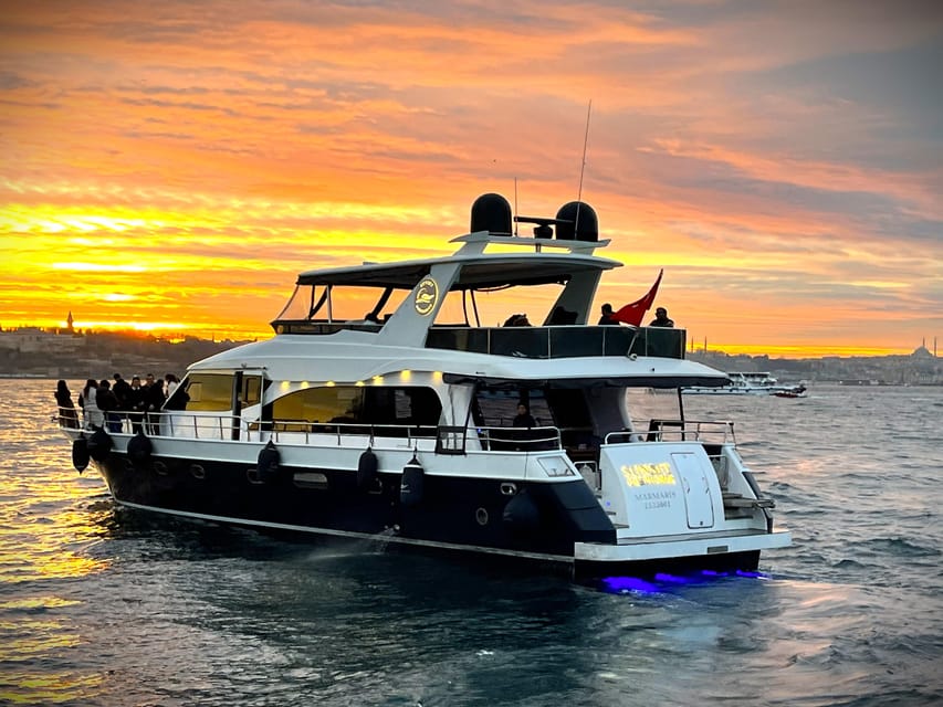Istanbul: Bosphorus Sunset Yacht Cruise with Live Guide - Crossing beneath Istanbul’s Bosphorus bridges