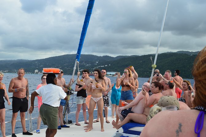 Jamaica Dunn's River Falls Party Cruise with Snorkeling - Climbing Dunn’s River Falls