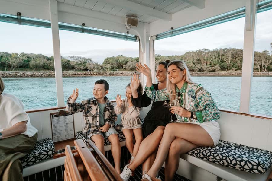 Mooloolaba: Canal Cruise with Commentary - Taking the helm and enjoying the onboard bar