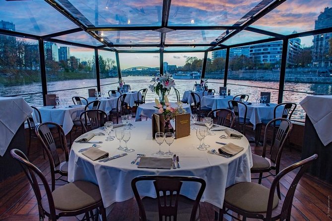 Paris 3-Course Gourmet Dinner and Sightseeing Seine River Cruise - A glass-enclosed view of Paris