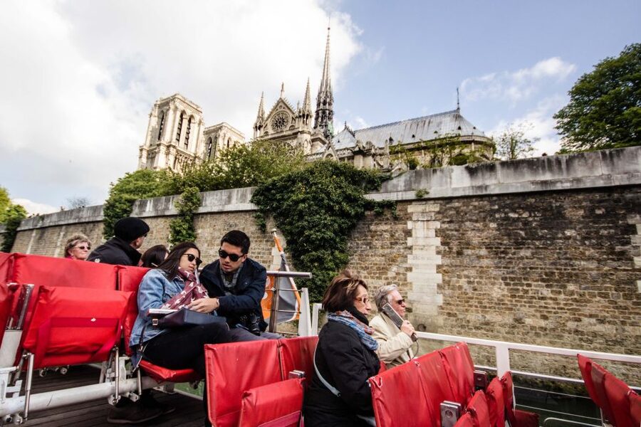 Paris: Eiffel Tower Hosted Tour, Seine Cruise and City Tour - A one-hour Seine cruise with major landmarks in view