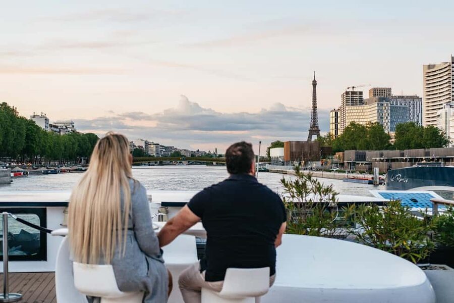Paris: Gourmet Dinner Cruise on Seine River with Live Music - A three-course menu with French and international touches