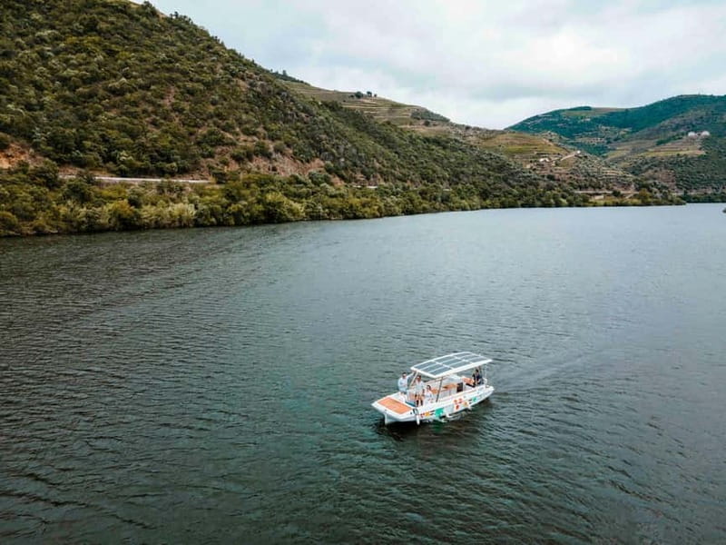 Pinhão: Douro River Solar Boat Tour with Wine Tasting - Two wines with a Douro view