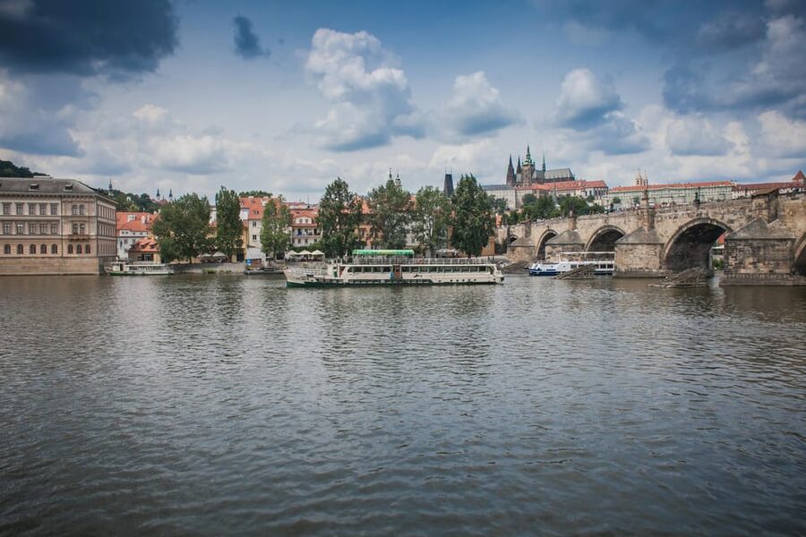 Prague: Vltava River Evening Dinner Cruise - Boarding the boat and choosing your expectations