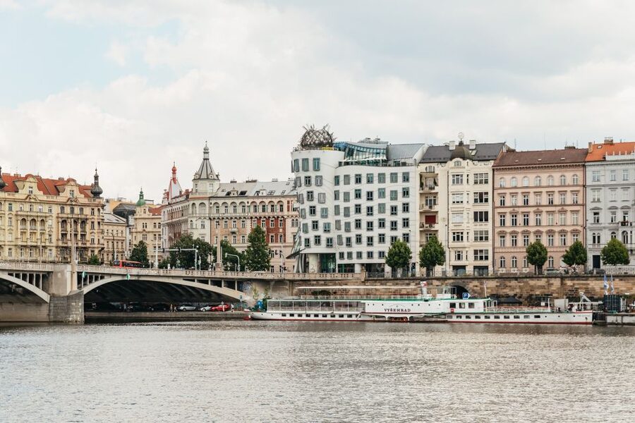 Prague: Vltava River Lunch Cruise in an Open-Top Glass Boat - Charles Bridge from below