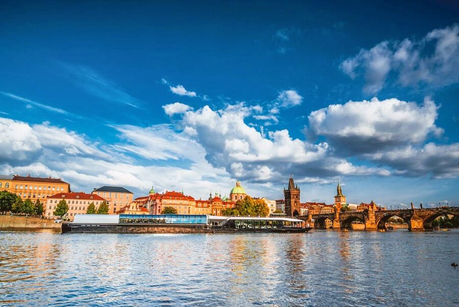 Prague: Vltava River Night Cruise with Buffet - Dancing House and Prague Castle after dark