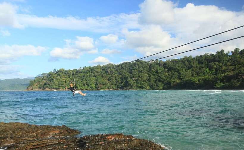 Puerto Princesa: Underground River, Zipline, Paddleboat Tour - Sabang Beach and the wharf process