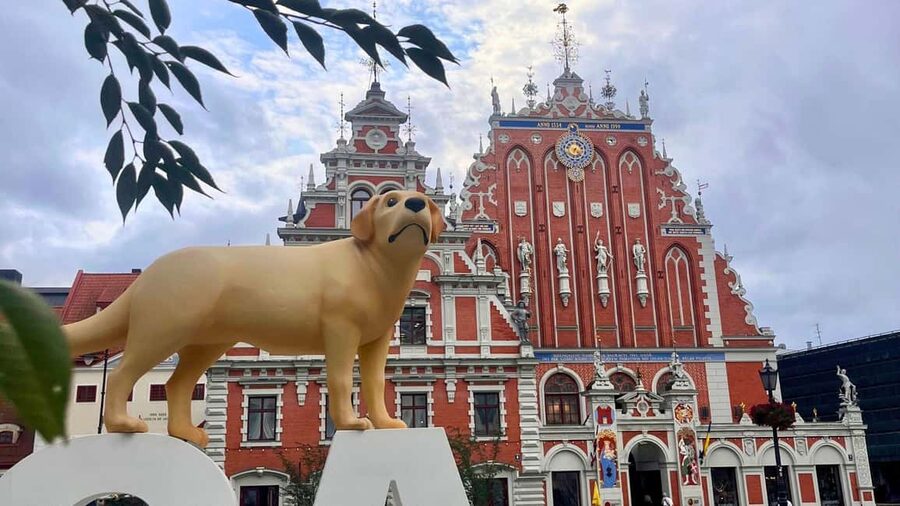 Riga: Canal Boat Tour with Drink & Old Town Audio Tour - Crossing under Riga’s major bridges
