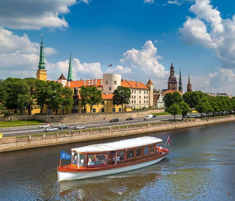 Riga: Canal & Daugava Cruise on a Historic Wooden Boat - Under the tunnel and past Riga Central Market