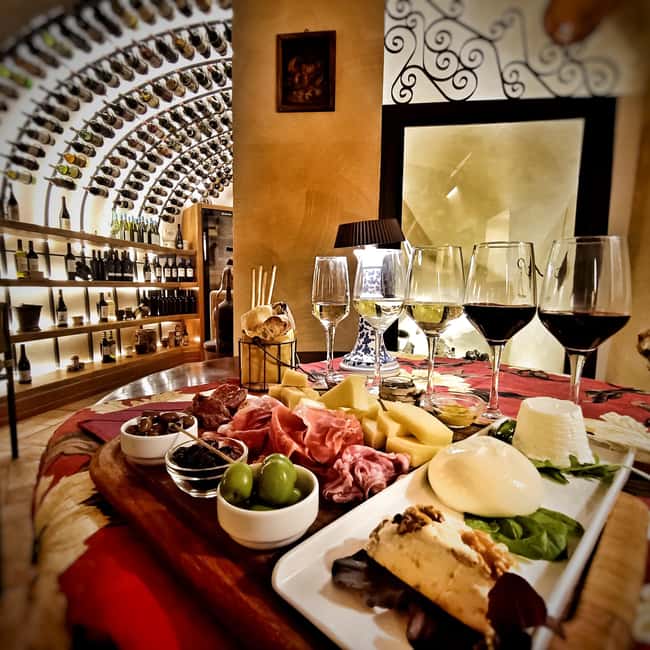 Rome: Food Tasting and Wine Pairing & Tiber River Boat Ride - A food tour from northern Italy to the south