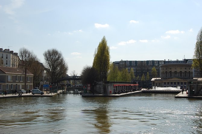 Seine River Cruise and Paris Canals Tour - Locks, lift bridges, and neighborhood views
