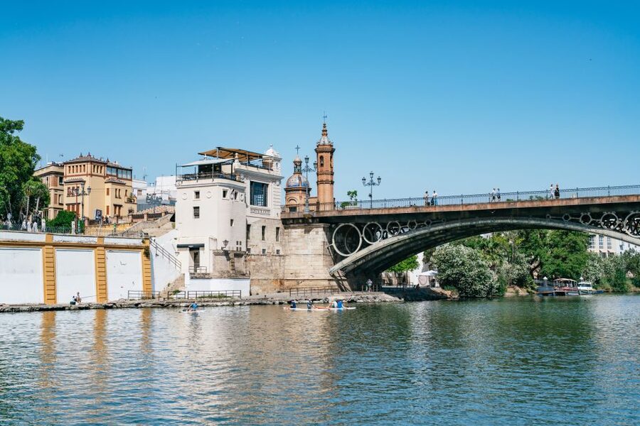 Seville: 1-Hour Guadalquivir River Sightseeing Eco Cruise - Old Seville beside newer towers