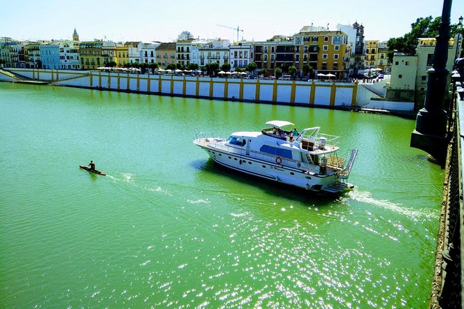 Seville: Cruise along the Guadalquivir River with appetizer - Boarding at Muelle Nueva York