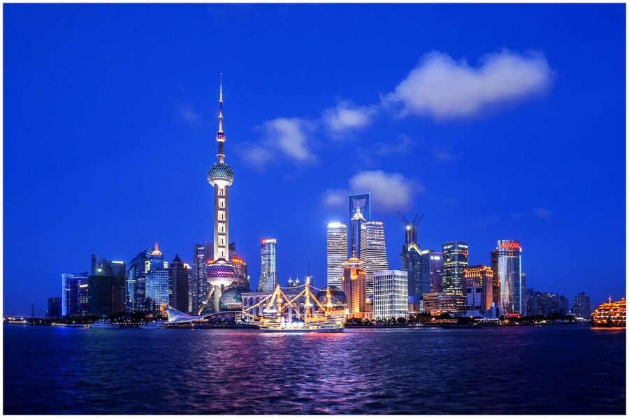 Shanghai: Night River Cruise Tour with Xinjiang Style Dining - What happens at the cruise terminal