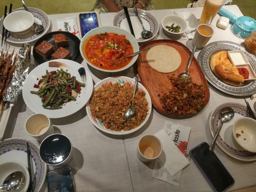 Shanghai: Night River Cruise Tour with Xinjiang Style Dining - Dinner in Pudong: a different side of Chinese food