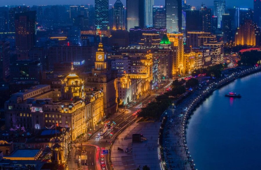 Shanghai: Night River Cruise Tour with Xinjiang Style Dining - The evening begins with a private pickup