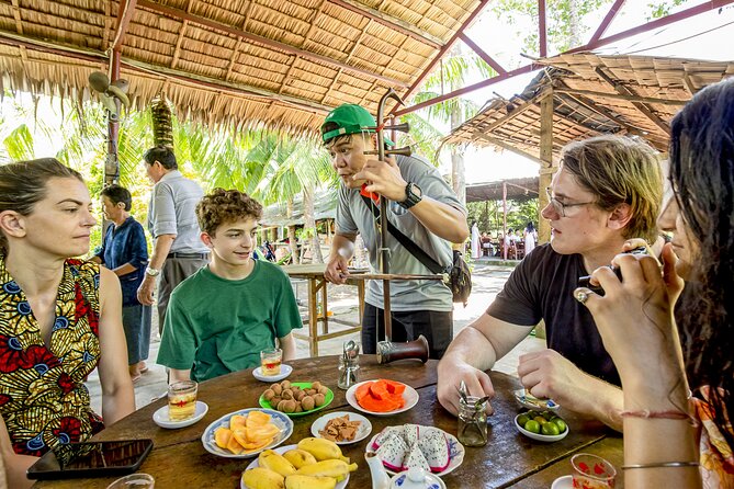 Small-Group Mekong Delta Day Trip: Boat Ride, Cottages & Pagoda - The hand-rowed boat through narrow canals