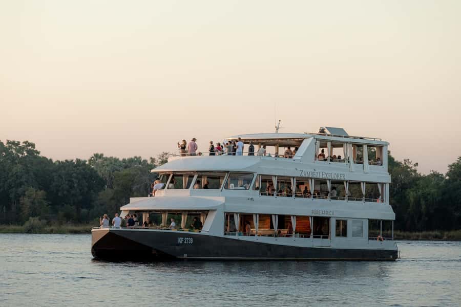 Victoria Falls: 2-Hour Luxury Zambezi River Sunset Cruise - Welcome drinks, canapés, and the first stretch upstream